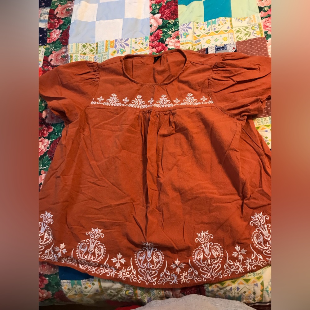 Brunt orange top